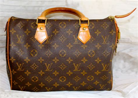 louis vuitton borsa bauletto lucchetto